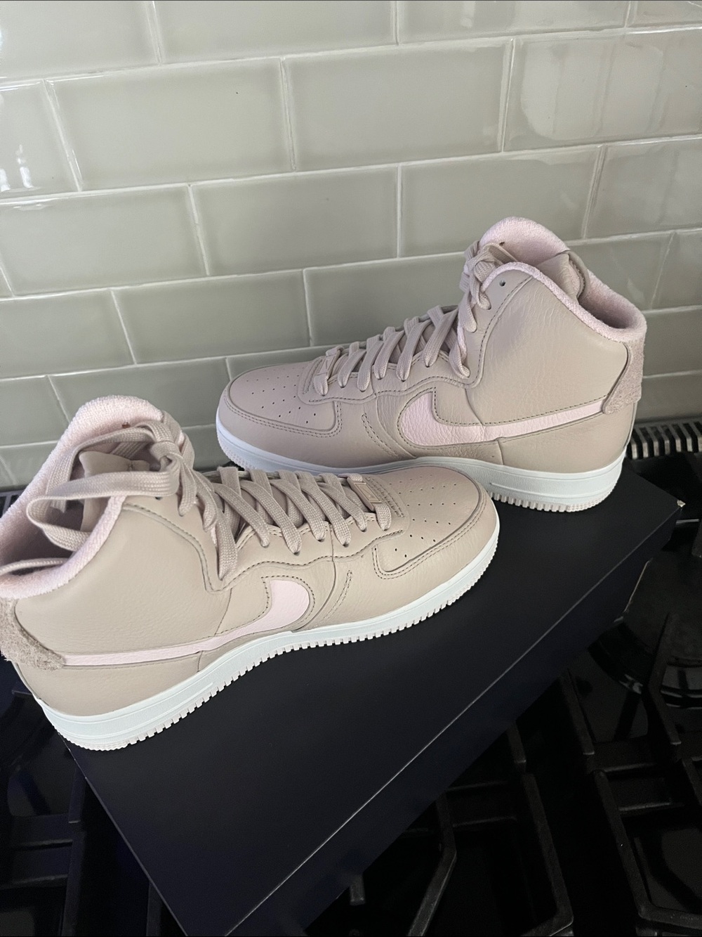 Nike Women's High-Top Sneakers in Pale Pink and White